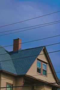 Residential house with a pitched roof and chimney