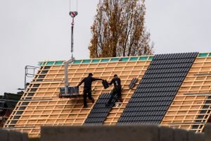 Roof replacement - installing new roof tiles