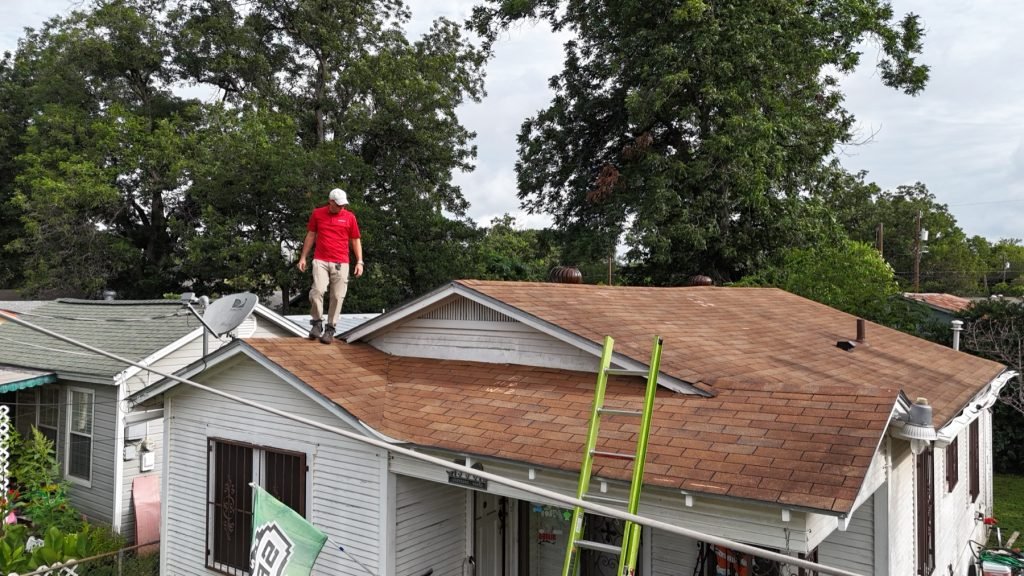 Strong Roofing Texas roofer working on a residential roof in San Antonio