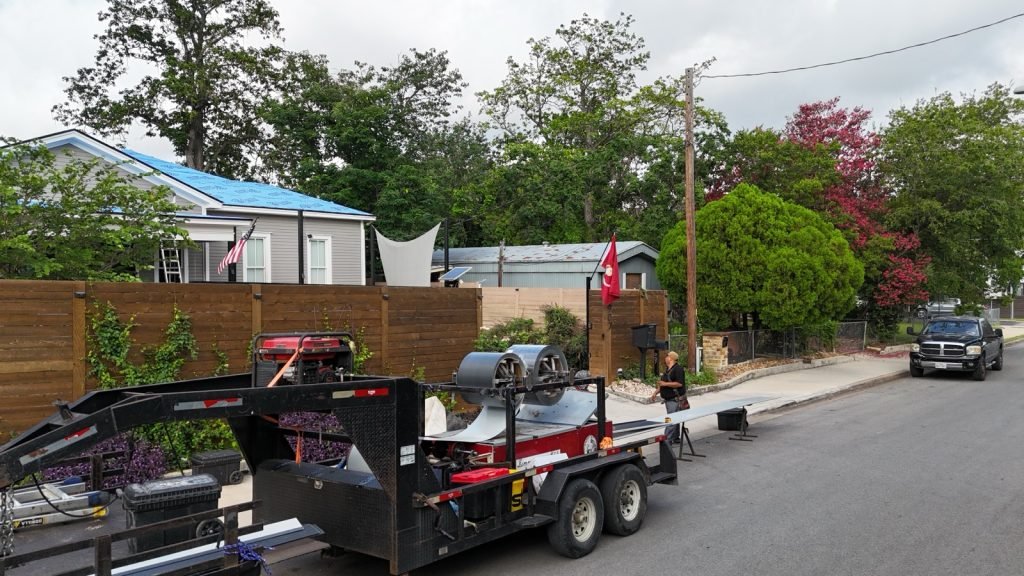 Storm-damaged roof tear-off and debris haul-away on a San Antonio home