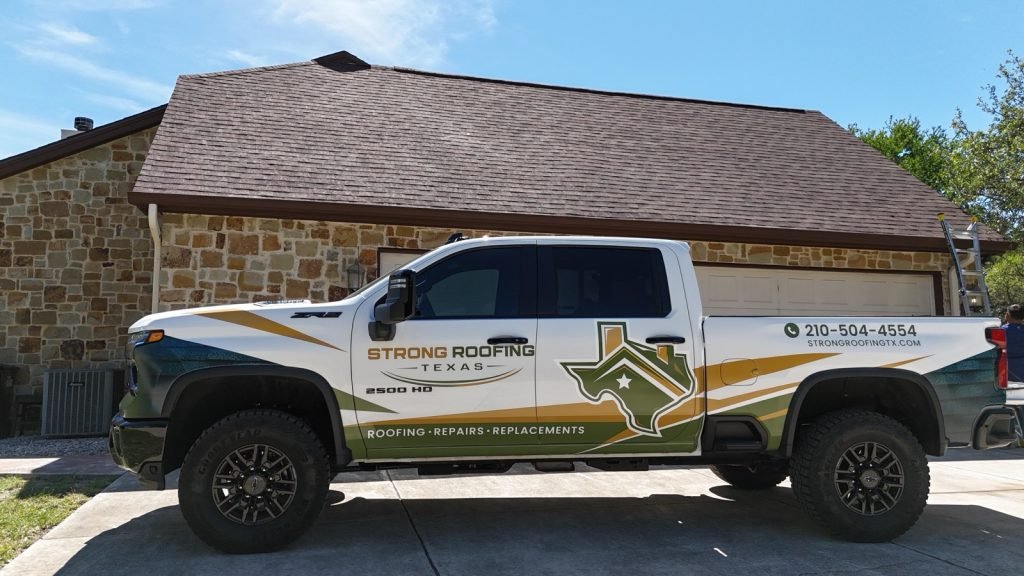 Strong Roofing Texas branded truck outside a completed San Antonio roof replacement